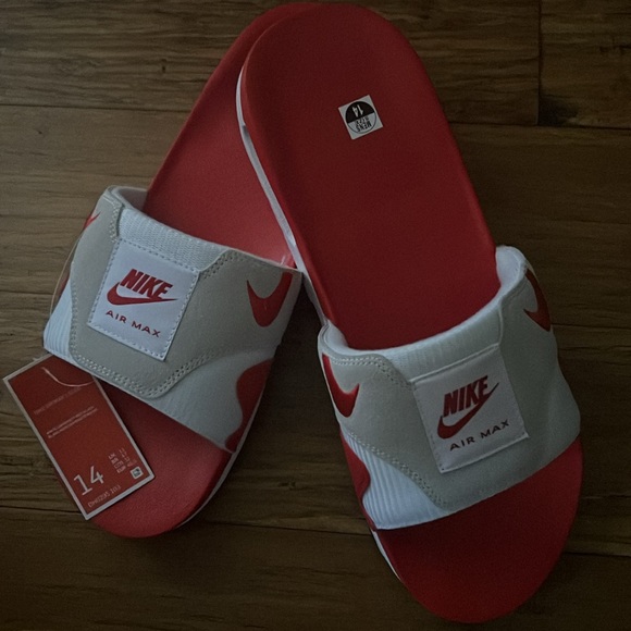 Listed for sale is a brand new pair of Nike slides. - Picture 2 of 2